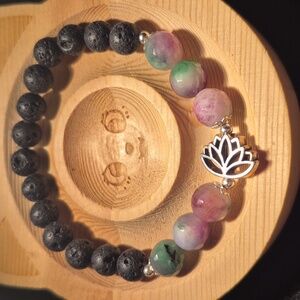 Watermelon tourmaline with lotus flower charm and lava beads